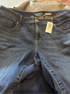 Torrid Dark Blue Wide Leg Jeans with Vintage Whiskering and frayed knees